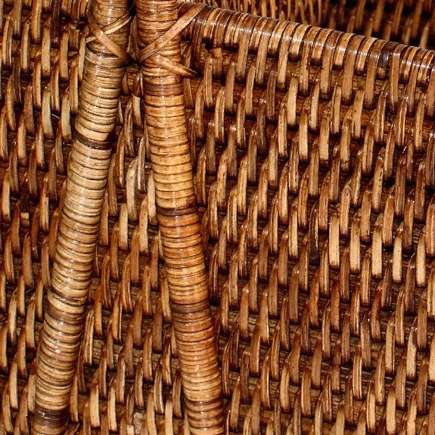 Rattan Wine Traveler woven of natural cane with a carrying handle details of the weave