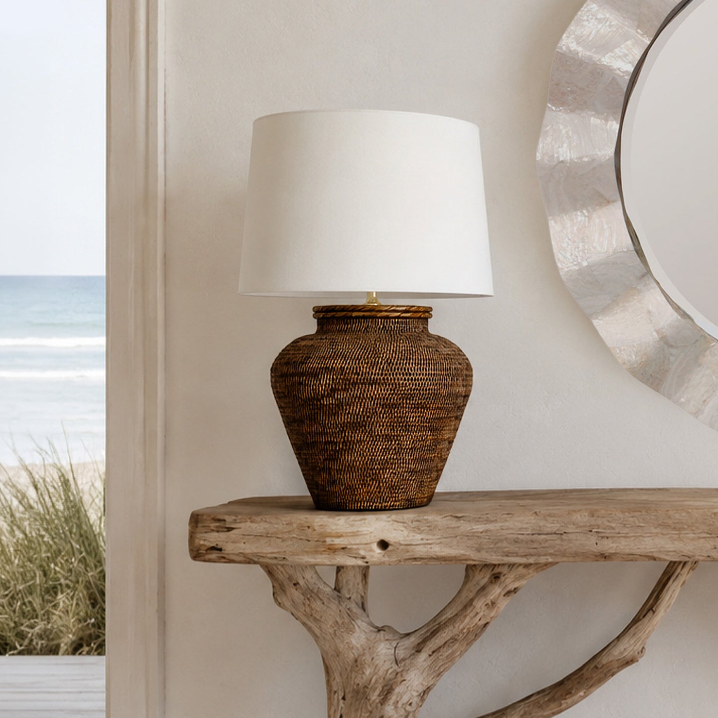 Cape Dark Rattan Table Lamp at the beach