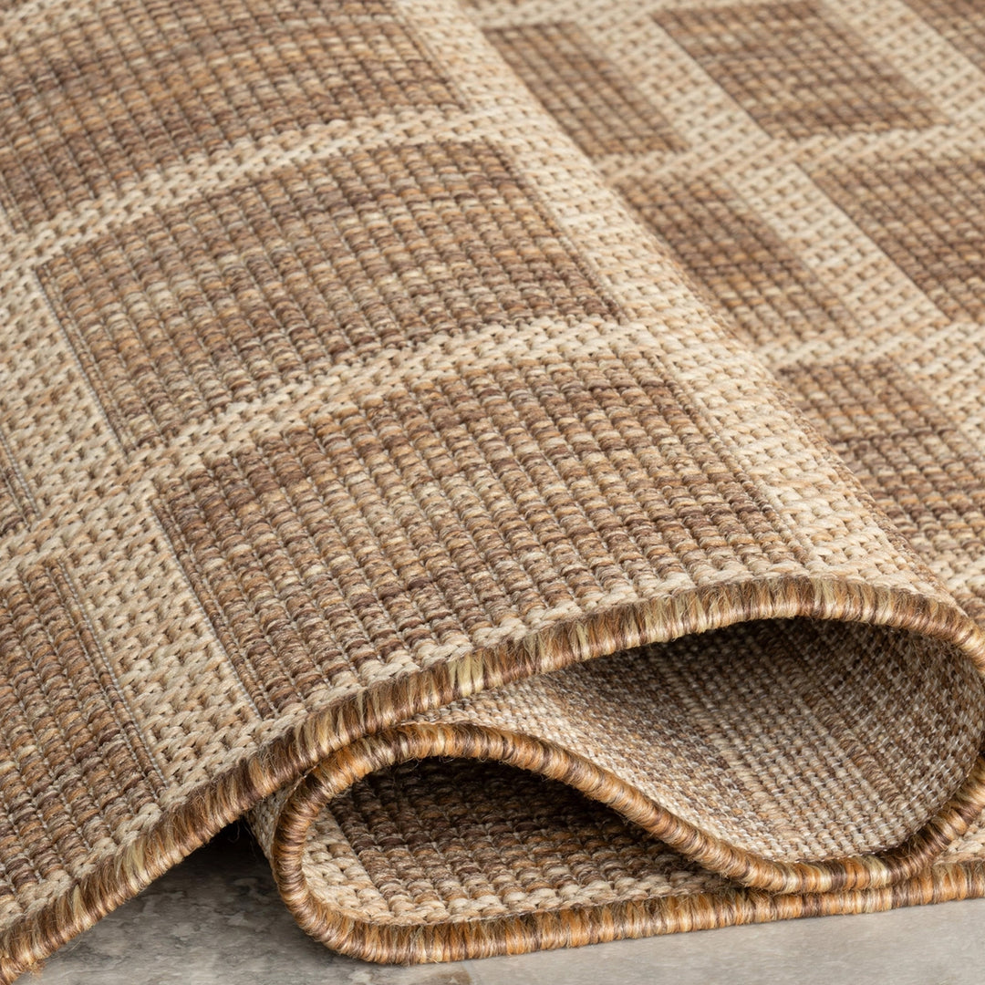 Ellie Outdoor Rug polypropylene geometric pattern folded edge