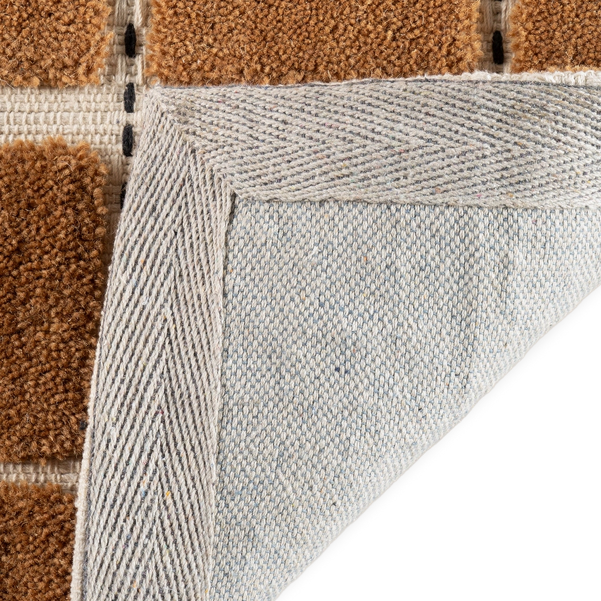 Wren Checkered Wool Rug underside of rug